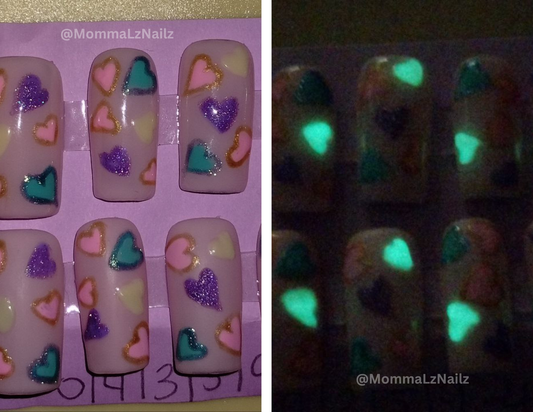 Glow Over glow-in-the-dark top coat on heart nail art