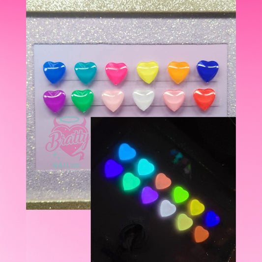 Glow Up & Show Out glow-in-the-dark gel polish shades shown on nail swatches